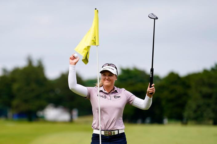 Brooke M. Henderson, of Canada, celebrates after winning the ShopRite LPGA Classic golf tournament, Sunday, June 12, 2022, in Galloway, N.J. (AP Photo/Matt Rourke)