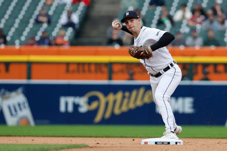 Detroit Tigers second baseman Zack Short makes a throw to first in the first inning against the Kansas City Royals at Comerica Park on September 28, 2023 in Detroit, Michigan.