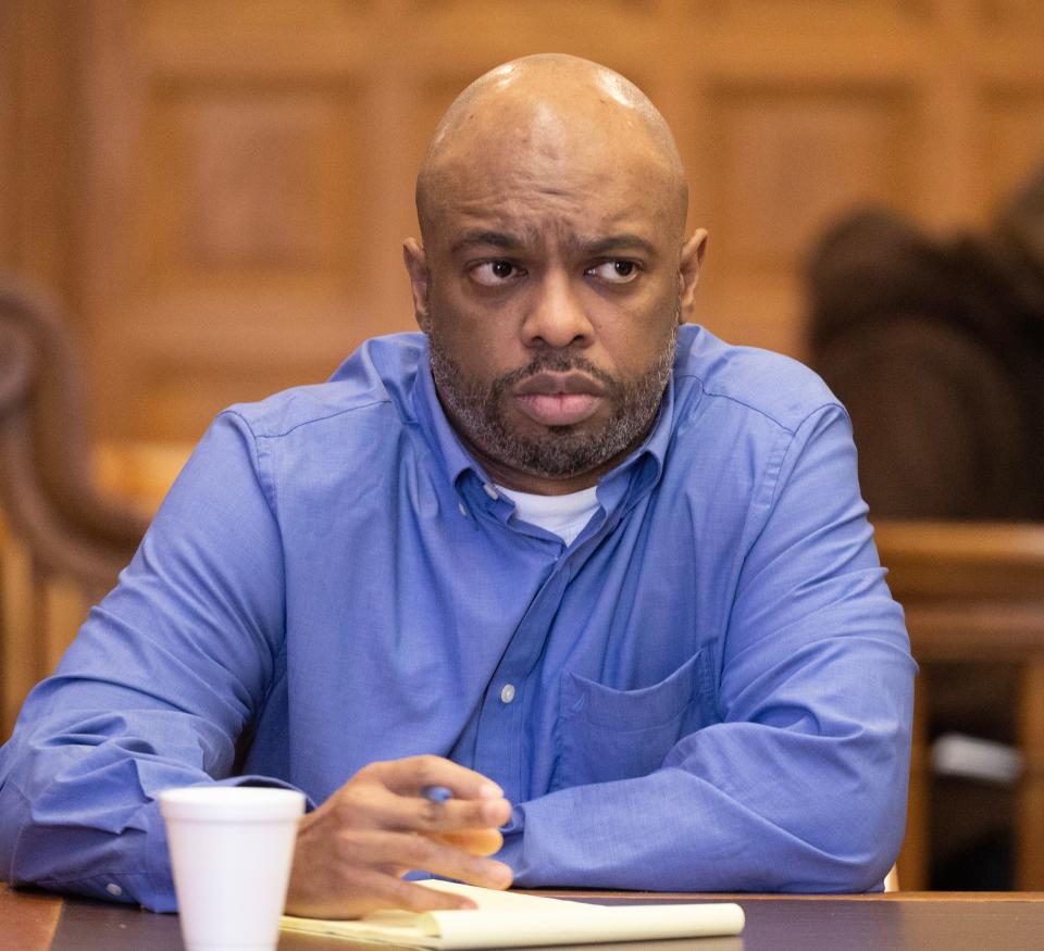 Willis R. Kennedy listens to Assistant Stark County Prosecutor Seth Marcum during opening statements in Judge Natalie Haupt's courtroom in Stark County Common Pleas Court on Monday. Kennedy is charged with murder for the stabbing death of Keith Greggs in 2023.