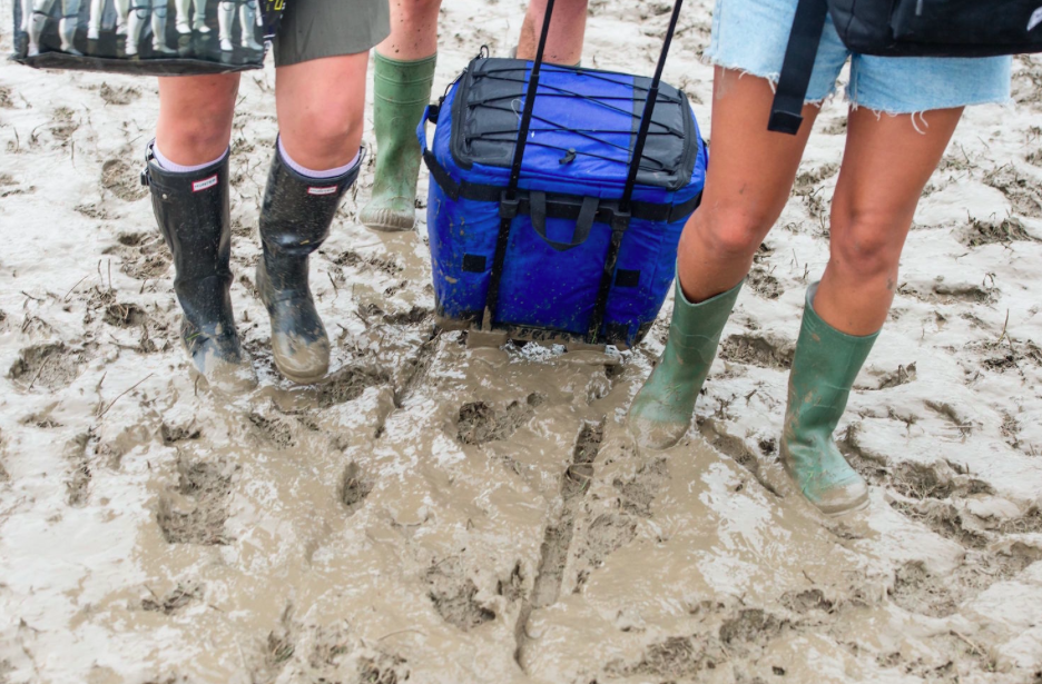 Most people arriving today turned up in wellies. Designer, obviously. (Rex)