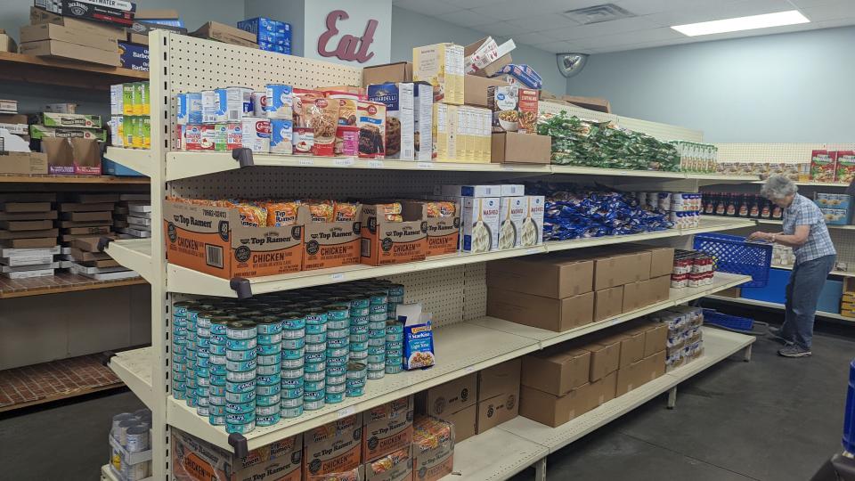 Shelves at the Salina Emergency Aid Food Bank pantry have some products, but there are noticeable gaps where food could be. The food bank is one of five agencies that will receive donations through Project Salina this year.