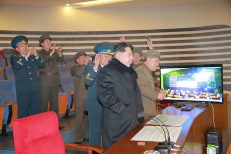 North Korean leader Kim Jong Un reacts as he watches a long range rocket launch in this undated photo released by North Korea's Korean Central News Agency (KCNA) in Pyongyang February 7, 2016. REUTERS/KCNA