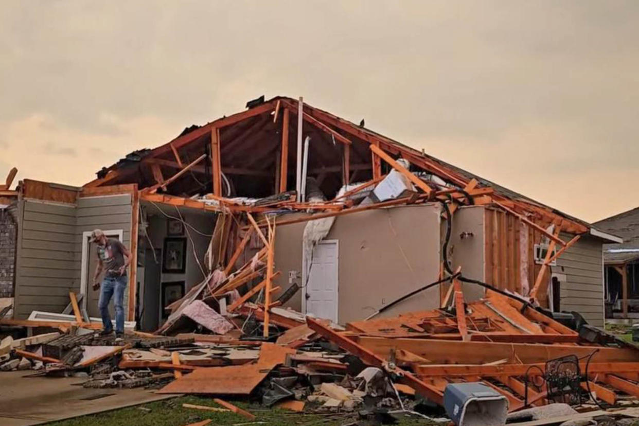 A resident assesses the damage after a tornado struck Temple, Texas. (Bryce Shelton / LSM)