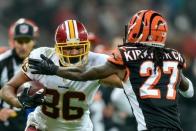 Oct 30, 2016; London, United Kingdom; Washington Redskins tight end Jordan Reed (86) pushes off against Cincinnati Bengals cornerback Dre Kirkpatrick (27) during the fourth quarter at Wembley Stadium. Mandatory Credit: Steve Flynn-USA TODAY Sports