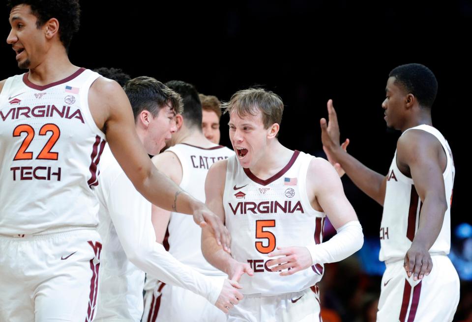 Storm Murphy of the Virginia Tech Hokies reacts during the first half against the Clemson Tigers in the 2022 Men's ACC Basketball Tournament.