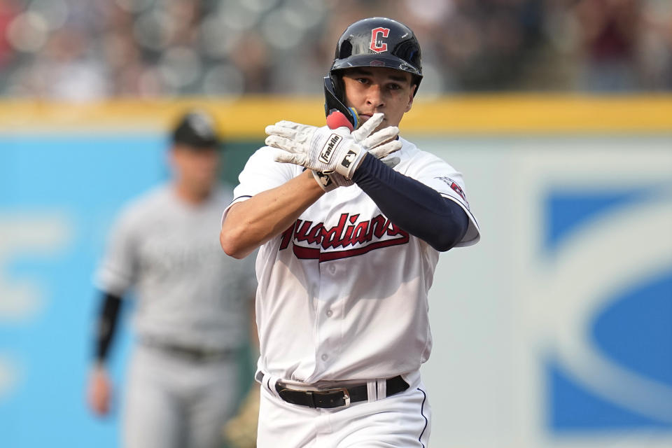 Cleveland Guardians' Will Brennan gestures as he runs the bases after hitting a home run against the Chicago White Sox during the third inning of a baseball game Tuesday, May 23, 2023, in Cleveland. (AP Photo/Sue Ogrocki)
