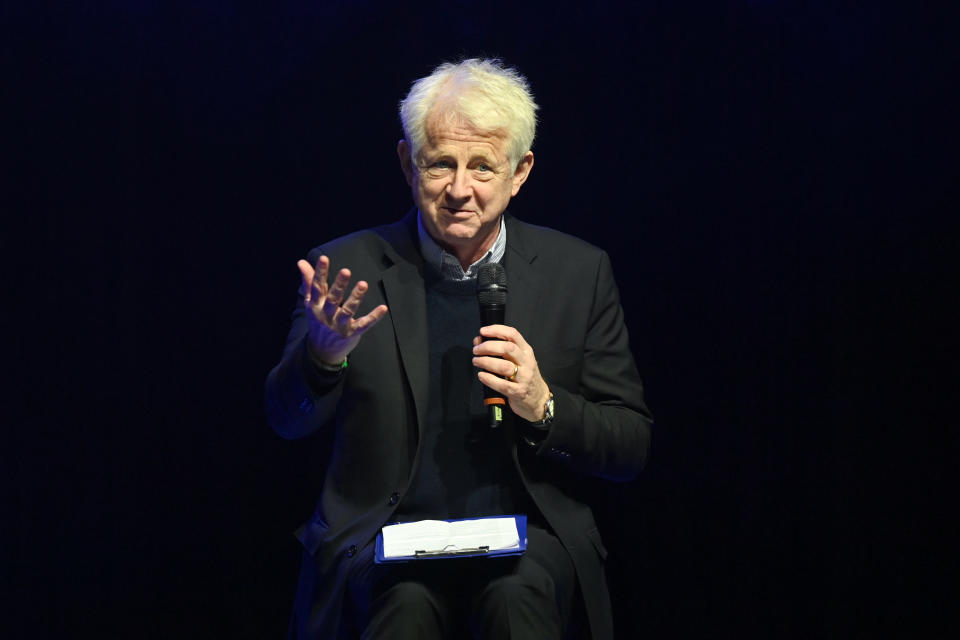 Richard Curtis speaks on stage at Cineworld 02 Arena