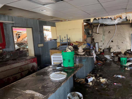 A damaged building is seen after a storm triggered historic flooding in Niobrara, Nebraska, U.S. March 16, 2019. Office of Governor Pete Ricketts/Handout via REUTERS