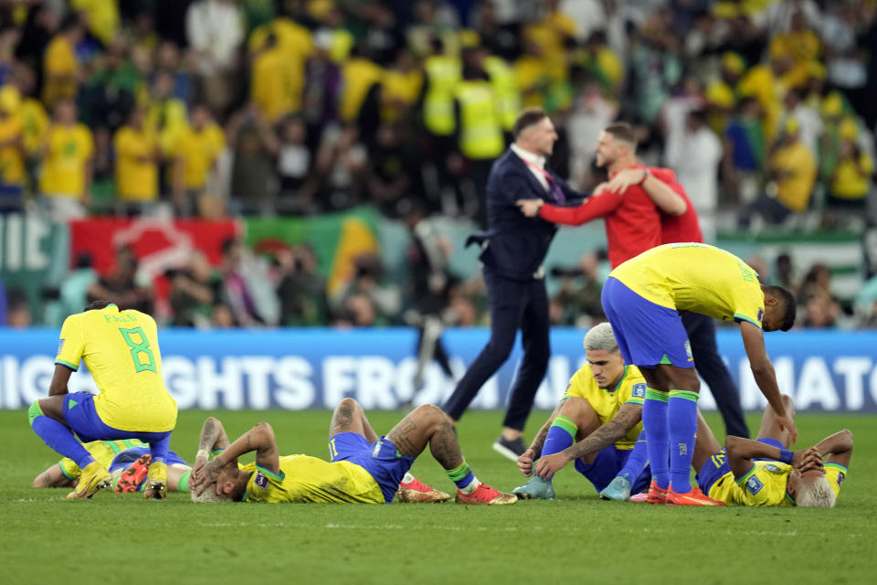 Brazil players react after they were defeated by Croatia after the World Cup quarterfinal soccer match between Croatia and Brazil, at the Education City Stadium in Al Rayyan, Qatar, Friday, Dec. 9, 2022. (AP Photo/Andre Penner)