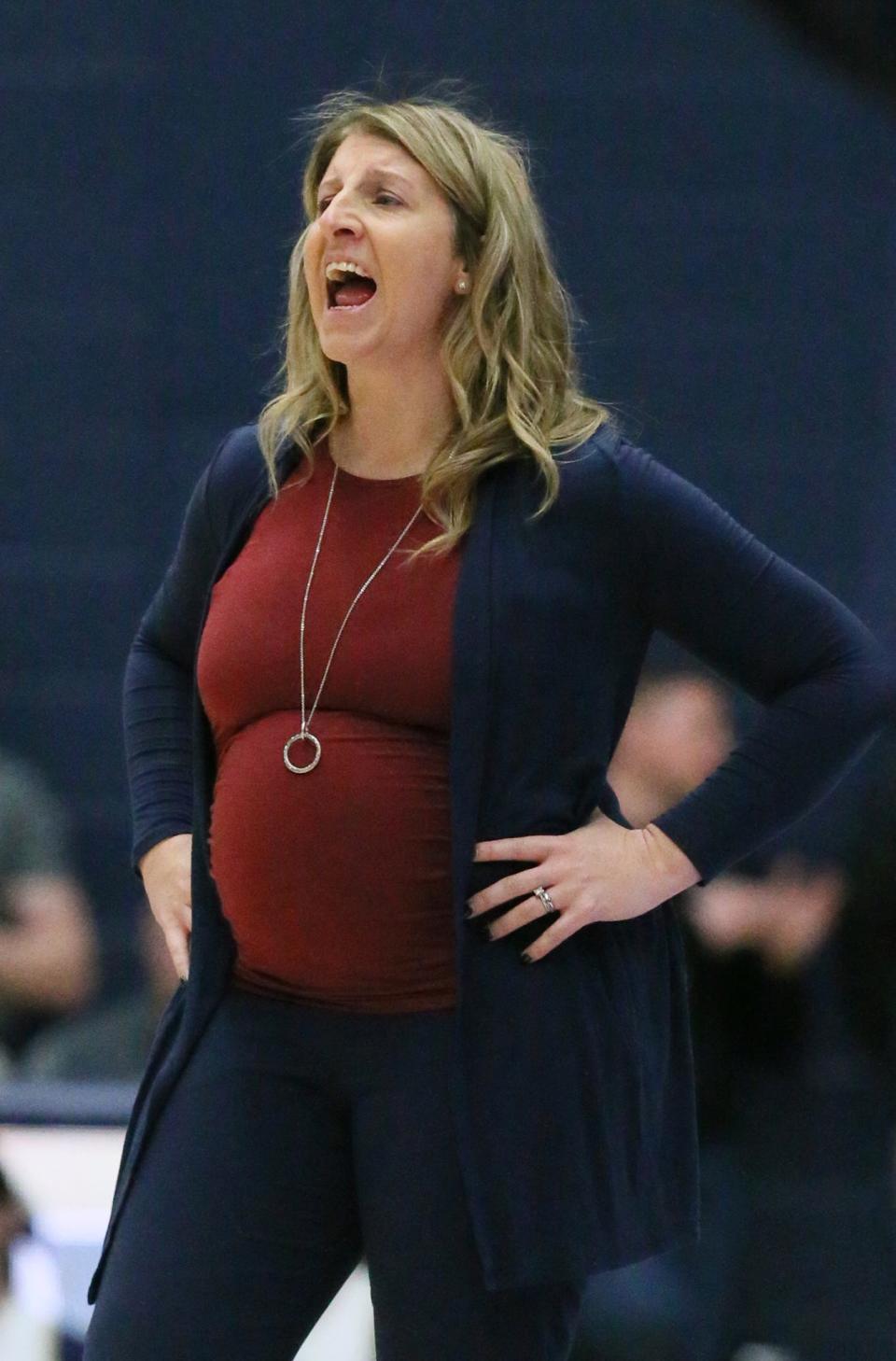 University of Akron women's basketball head coach Melissa Jackson calls out to her team during a home game against Kent State University during the 2022-23 season.