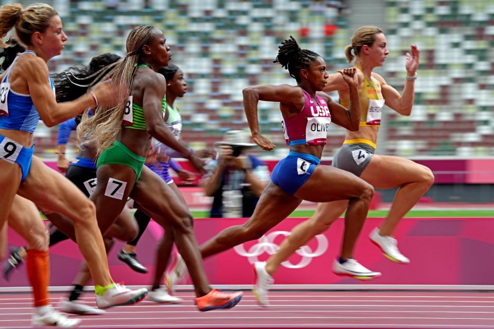 Javianne Oliver of the U.S. competes in the women's 100-meter quarterfinal heats at Olympic Stadium.