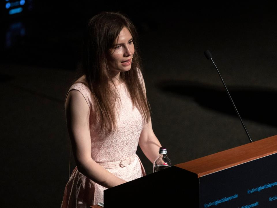 <p>Amanda Knox delivers a speech during the Criminal Justice Festival, an event organised by The Italy Innocence Project and the local association of barristers, on 15 June 2019 in Modena</p> (Getty)