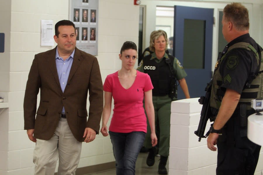 ORLANDO, FL – JULY 17: Casey Anthony (C) leaves with her attorney Jose Baez (L) from the Booking and Release Center at the Orange County Jail after she was acquitted of murdering her daughter Caylee Anthony on July 17, 2011 in Orlando, Florida. It was unknown where Casey Anthony was going after the release. (Photo by Red Huber-Pool/Getty Images)