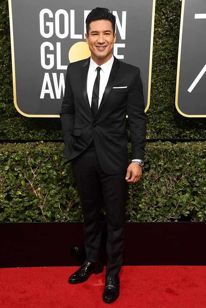 <p>The <em>Extra</em> host arrives at the 75th annual Golden Globes in Los Angeles. (Photo: Frazer Harrison/Getty Images) </p>