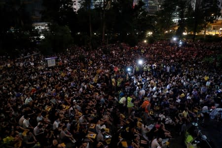 Anti-extradition bill protesters attend a rally calling on the British and U.S. governments to monitor the implementation of "one country two systems" principal, in Hong Kong