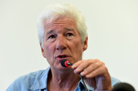 U.S. actor Richard Gere holds a news conference in support of an NGO ship "Open Arms", which carries stranded migrants, in Lampedusa