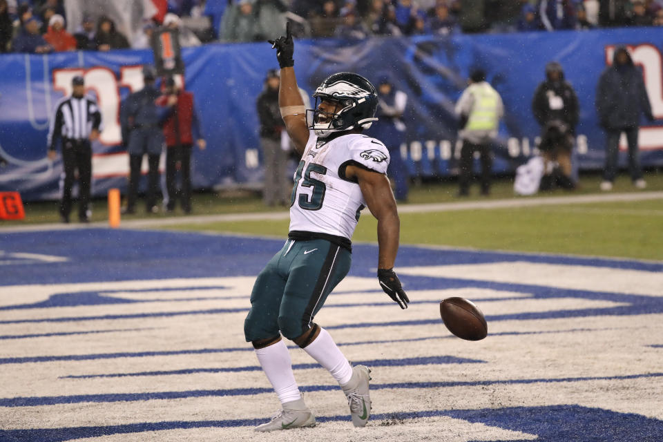 Philadelphia Eagles running back Boston Scott (35) celebrates scoring a touchdown in the second half of an NFL football game against the New York Giants, Sunday, Dec. 29, 2019, in East Rutherford, N.J. (AP Photo/Seth Wenig)