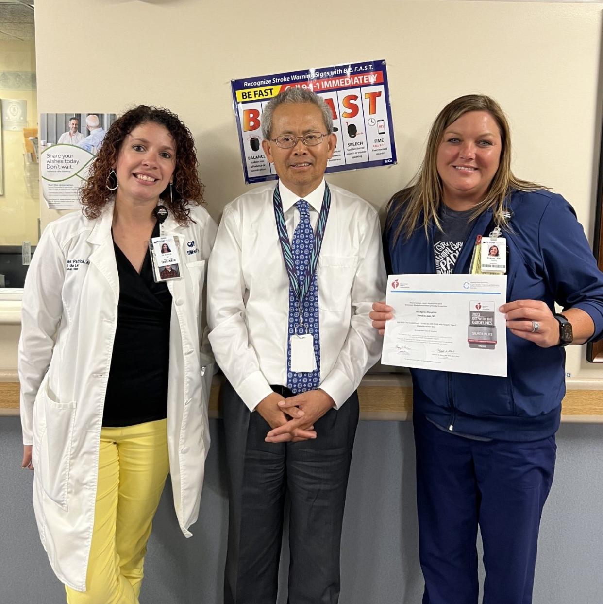 SSM Health St. Agnes Hospital Stroke team members celebrate their recent Get With The Guidelines honor. Pictured are, from left, Renae Patrick, nurse practitioner; Dr. Xian-Feng Gu, neurologist; and Stacey Sesing, program coordinator.