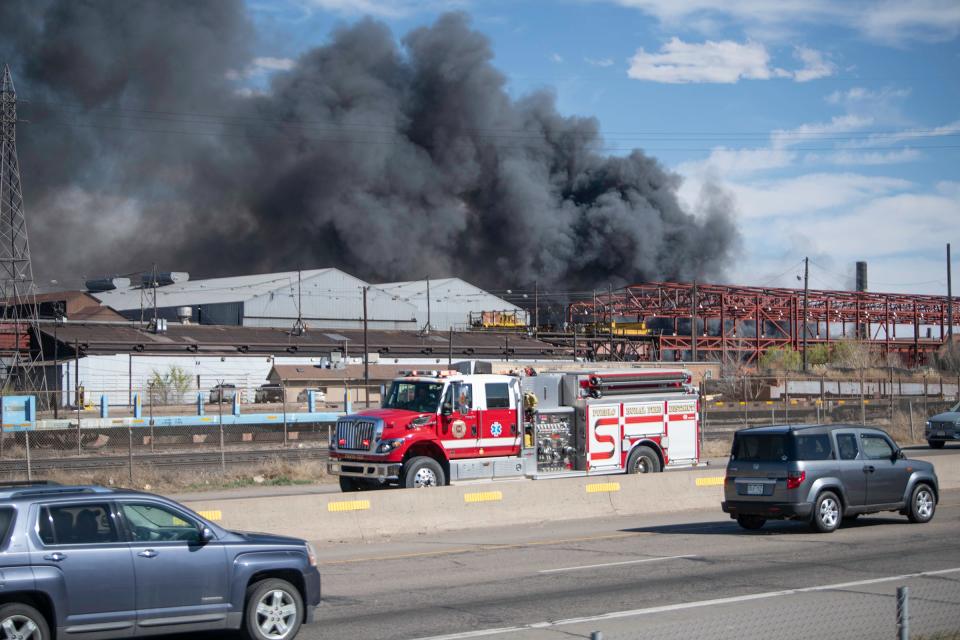 A fire truck races down Interstate 25 in response to a fire at the Evraz steel mill on Friday, April 5, 2024.