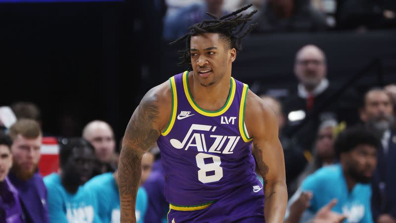 Utah Jazz forward Brice Sensabaugh (8) celebrates a basket in Salt Lake City on Thursday, Feb. 22, 2024.