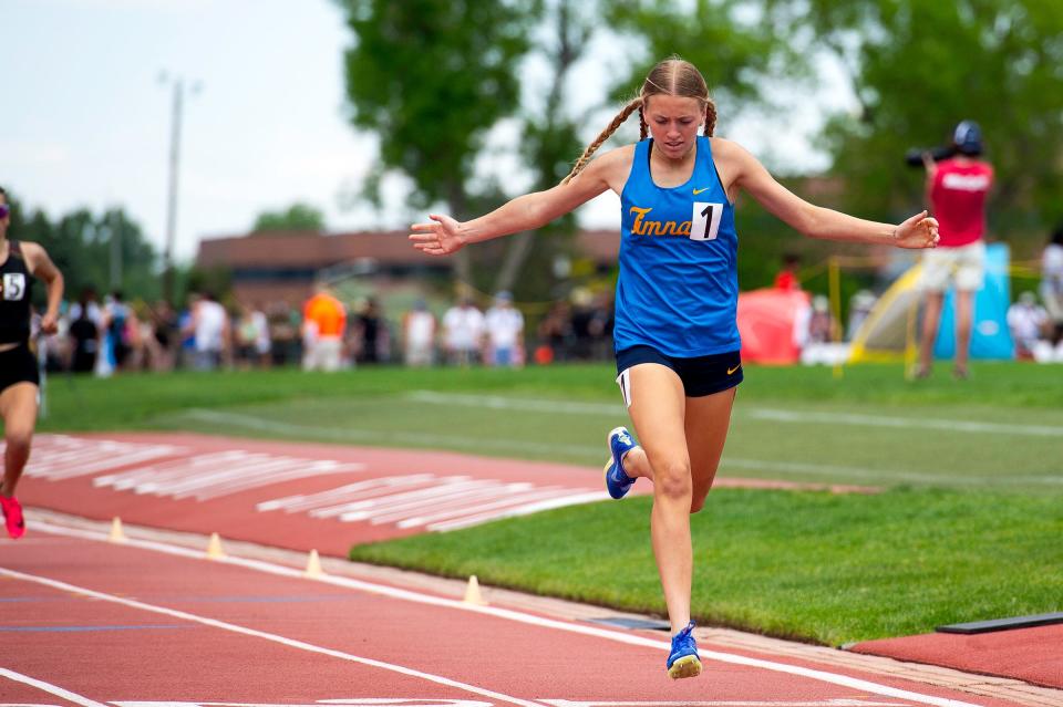 Timnath's Natalie Washburn crosses the finish line in first place at the 2A girls 800 meter race during the Colorado track & field state championships on Friday, May 17, 2024 at Jeffco Stadium in Lakewood, Colo.