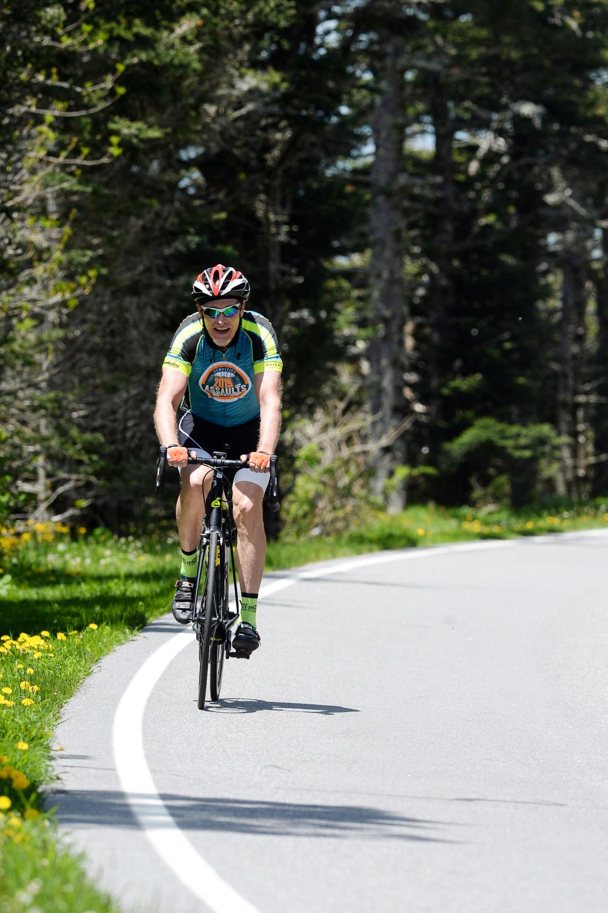 Cyclists make the final ascent in the 102.7-mile Assault on Mt. Mitchell May 20, 2019.
