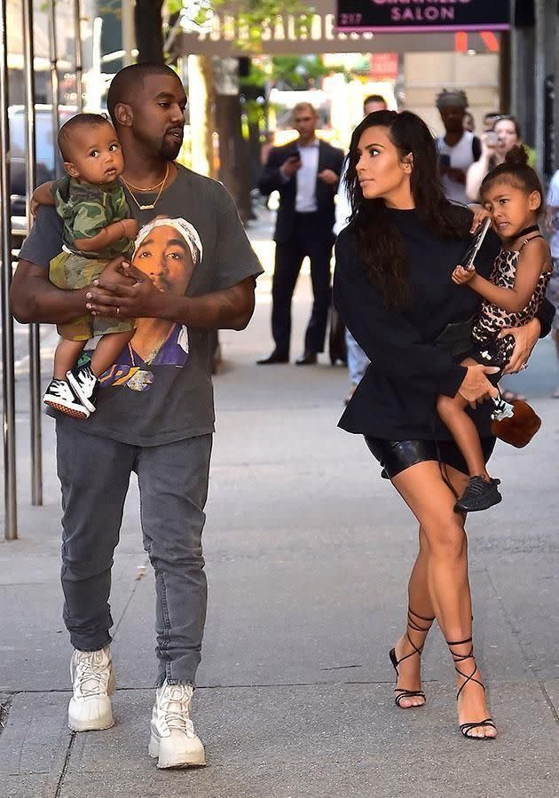 Kanye and Kim are reportedly expecting a third child via surrogate. Source: Getty