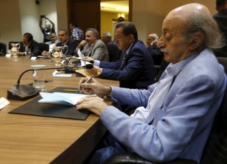 Lebanon's Druze leader Walid Jumblatt (R) attends with other politicians a third session of the national dialogue talks aimed at discussing ways out of a political crisis, at the parliament building, in downtown Beirut, Lebanon September 22, 2015. REUTERS/Jamal Saidi