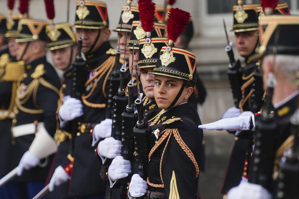 Troops from France's 1er Regiment de le Garde Republicaine arrive at Buckingham Palace, to partake in the Changing of the Guard ceremony, to commemorate the 120th anniversary of the Entente Cordiale - the historic diplomatic agreement between Britain and France which laid the groundwork for their collaboration in both world wars, in London, Monday, April 8, 2024. France is the first non-Commonwealth country to take part in the Changing of the Guard. (Victoria Jones/Pool Photo via AP)