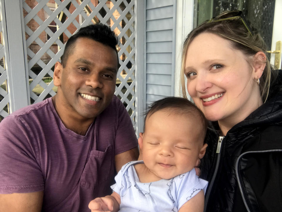 Lindsay Preseau with her husband, Ritwik Banerji, and son, Ludo. When she went into labor, lockdowns and other measures were being implemented. 