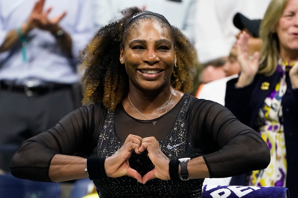 Serena Williams makes a heart sign after beating Danka Kovinic (John Minchillo/AP) (AP)