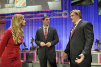 Alabama's Barrett Jones, right, talks with Stanford's Andrew Luck, center, and ESPN's Erin Andrews after the College Football Awards ceremony in Lake Buena Vista, Fla., Thursday, Dec. 8, 2011.(AP Photo/Phelan M. Ebenhack)