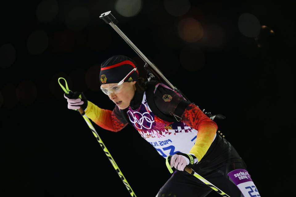 FILE - In this Feb. 17, 2014 file photo, Germany's Evi Sachenbacher-Stehle skis during the women's biathlon 12.5k mass-start, at the 2014 Winter Olympics, in Krasnaya Polyana, Russia. German Olympic officials said Sachenbacher-Stehle has been kicked out of the Sochi Games after a positive doping test. The German Olympic Committee said she tested positive on Monday, Feb. Feb. 17, for the stimulant methylhexanamine. Both the "A'' sample and backup "B'' sample were positive. The committee said the athlete has been removed from the team and is being sent home. (AP Photo/Felipe Dana, File)