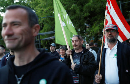 Members of far-right, nationalist groups attend a protest against criminal attacks caused by youth, in Torokszentmiklos, Hungary, May 21, 2019. REUTERS/Bernadett Szabo