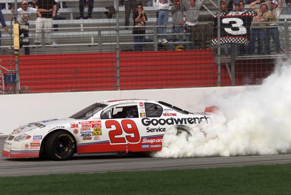 11 Mar 2001: Kevin Harvick in the #29 Childres Racing Chevrolet Monte Carlo celebrates by doing donuts after winning the Winston Cup Cracker Barrel 500 at Atlanta Motorspeedway in Hampton, Georgia. Digital Image. Mandatory Credit: Jonathan Ferrey/ALLSPORT