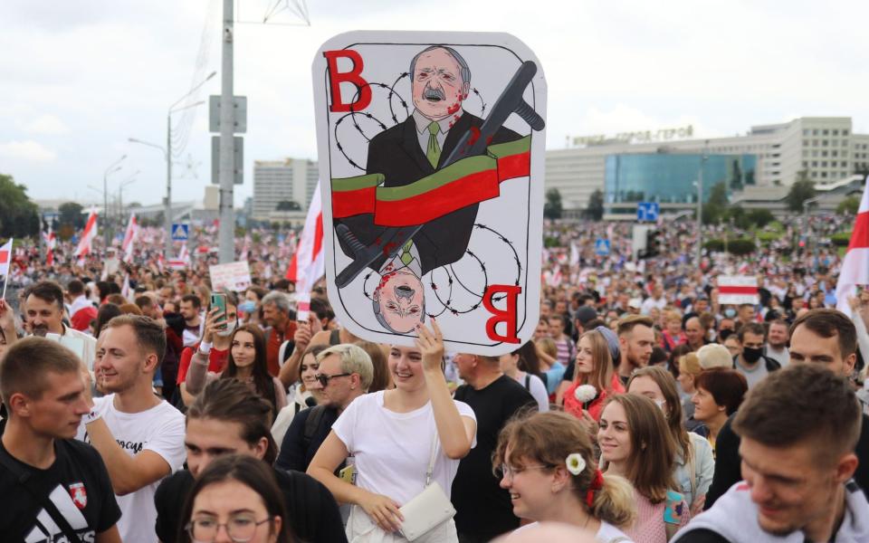 Belarus opposition supporters attend a rally to protest against the disputed August 9 presidential elections - AFP