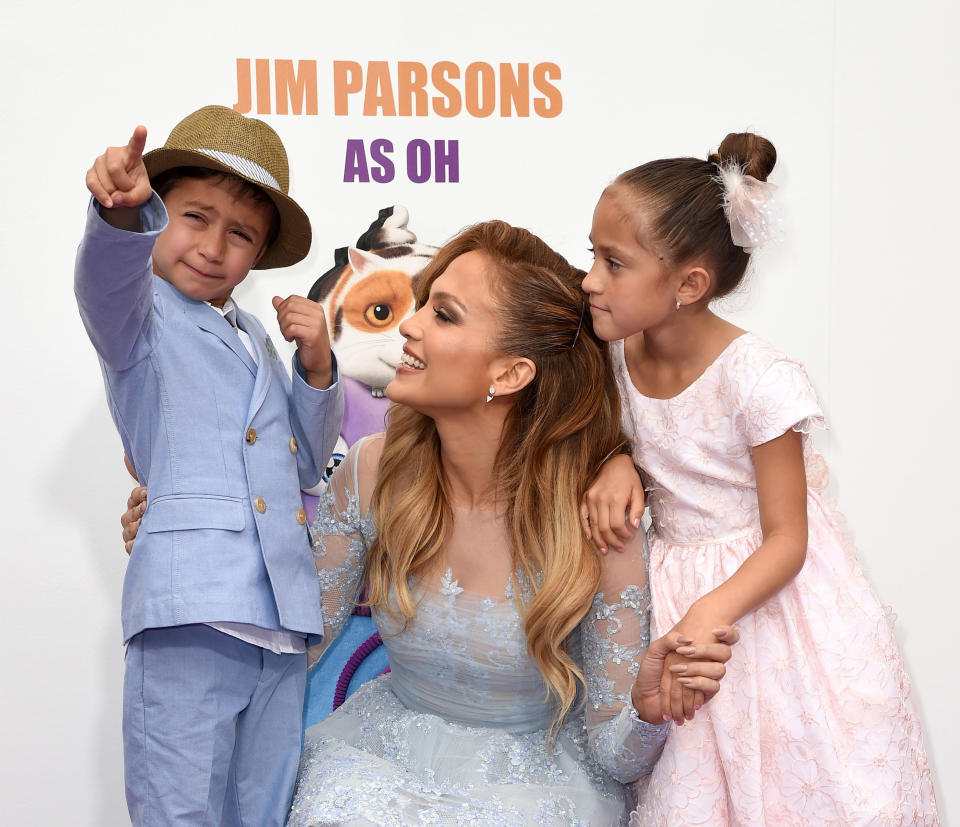 WESTWOOD, CA - MARCH 22:  Jennifer Lopez (C) with daughter Emme (R) and son Max attend the premiere of  Twentieth Century Fox And Dreamworks Animation's "HOME" at Regency Village Theatre on March 22, 2015 in Westwood, California.  (Photo by Kevin Winter/Getty Images)