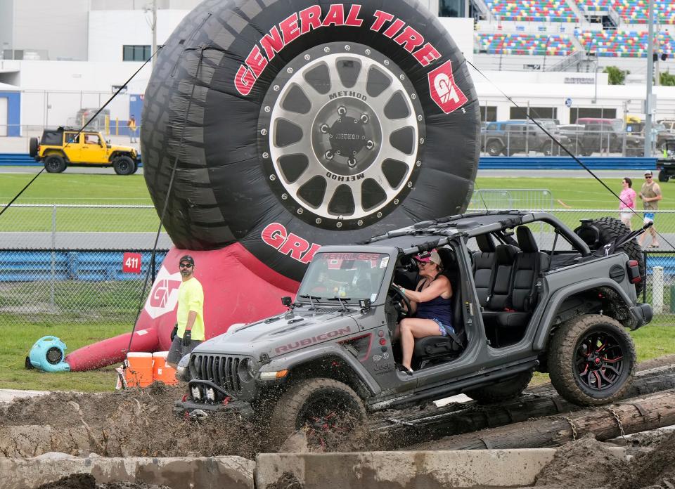 Jeeps took to the obstacle course on Friday at the opening day of the Jeep Beach "Main Event" at Daytona International Speedway. The Speedway event continues on Saturday, with a concert by pop star Colbie Caillat.
