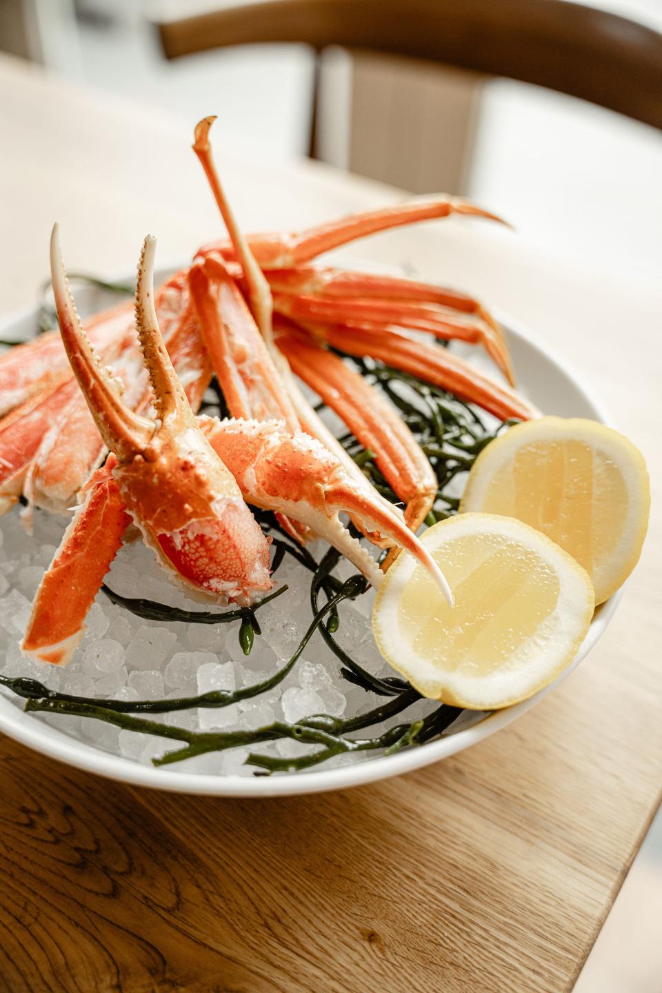 The Italian-ish menu includes seafood fare like snow crab served with mis butter.