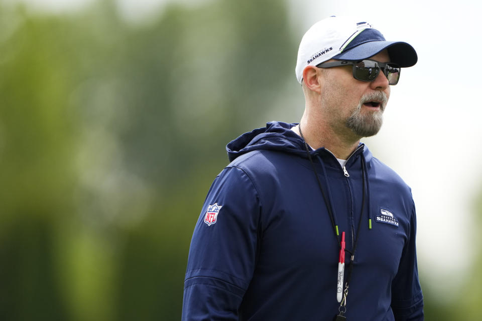 Seattle Seahawks offensive coordinator Ryan Grubb walks off the field following the NFL football team's rookie minicamp Friday, May 3, 2024, in Renton, Wash. (AP Photo/Lindsey Wasson)