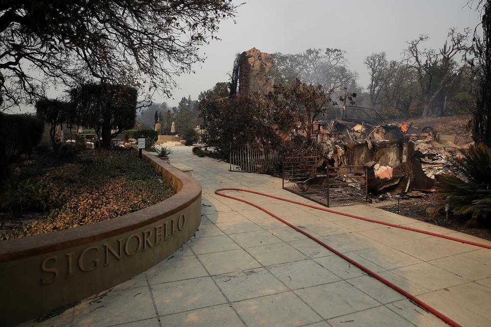 <p>The remains of the fire damaged Signarello Estate Winery after an out of control wildfire moved through the area on Oct. 9, 2017 in Napa, Calif.(Photo: Justin Sullivan/Getty Images) </p>