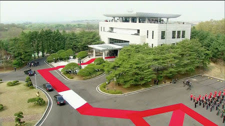 South Korean President Moon Jae-in's convoy arrives for the inter-Korean summit at the truce village of Panmunjom, in this still frame taken from video, South Korea April 27, 2018. Host Broadcaster via REUTERS TV