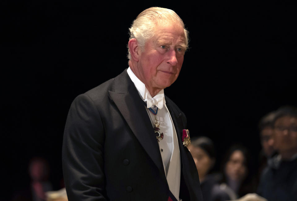 Britain's Prince Charles arrives at the Imperial Palace for the Court Banquets after the enthronement ceremony of Emperor Naruhito in Tokyo Tuesday, Oct. 22, 2019. (Pierre-Emmanuel Deletree/Pool Photo via AP)