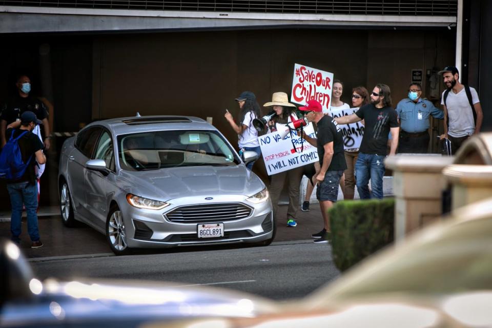 <div class="inline-image__title">1235150363</div> <div class="inline-image__caption"><p>Demonstrators opposed to masking and mandatory vaccination for students gather outside the Los Angeles Unified School District headquarters on Sept. 9, 2021. </p></div> <div class="inline-image__credit">Jason Armond</div>