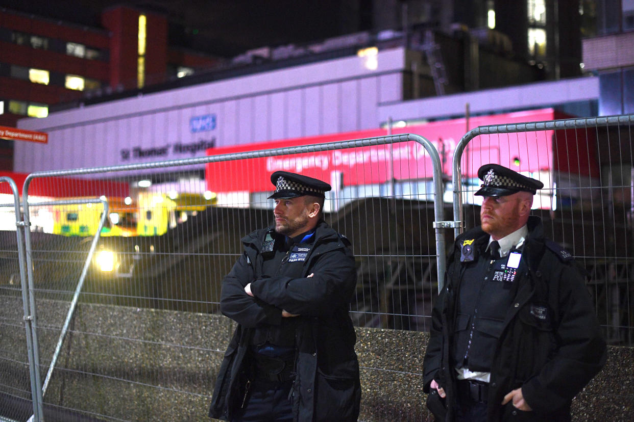 Police outside St Thomas' Hospital in central London, where the prime minister was moved to intensive care on Monday evening. (PA)