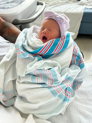 <p>Cleveland Clinic</p> Scierra Blair and fiancé José Ervin's yawning Aug. 18 baby
