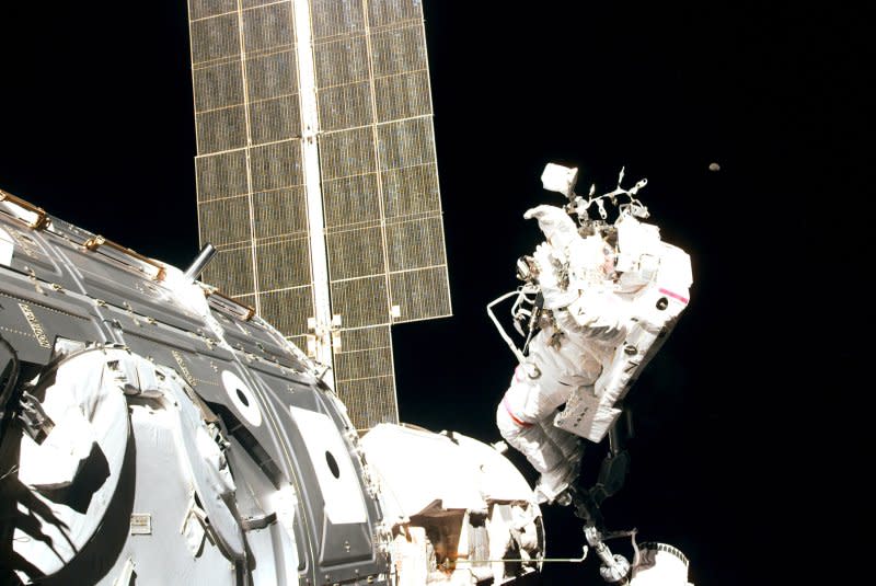 Astronaut Jerry L. Ross takes a picture during a 7-hour, 21-minute spacewalk aboard Space Shuttle Endeavor, December 8, 1998, while in orbit to connect the Zarya control module to Unity. On November 20, 1998, Zarya, the first module that would make up the International Space Station, was launched from Kazakhstan. File Photo by Jerry L. Ross/NASA