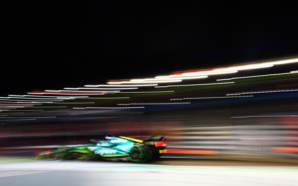 Lance Stroll of Canada driving the (18) Aston Martin AMR22 Mercedes in the Pitlane during qualifying ahead of the F1 Grand Prix of Singapore at Marina Bay Street Circuit on October 01, 2022 in Singapore, Singapore - Getty Images AsiaPac 