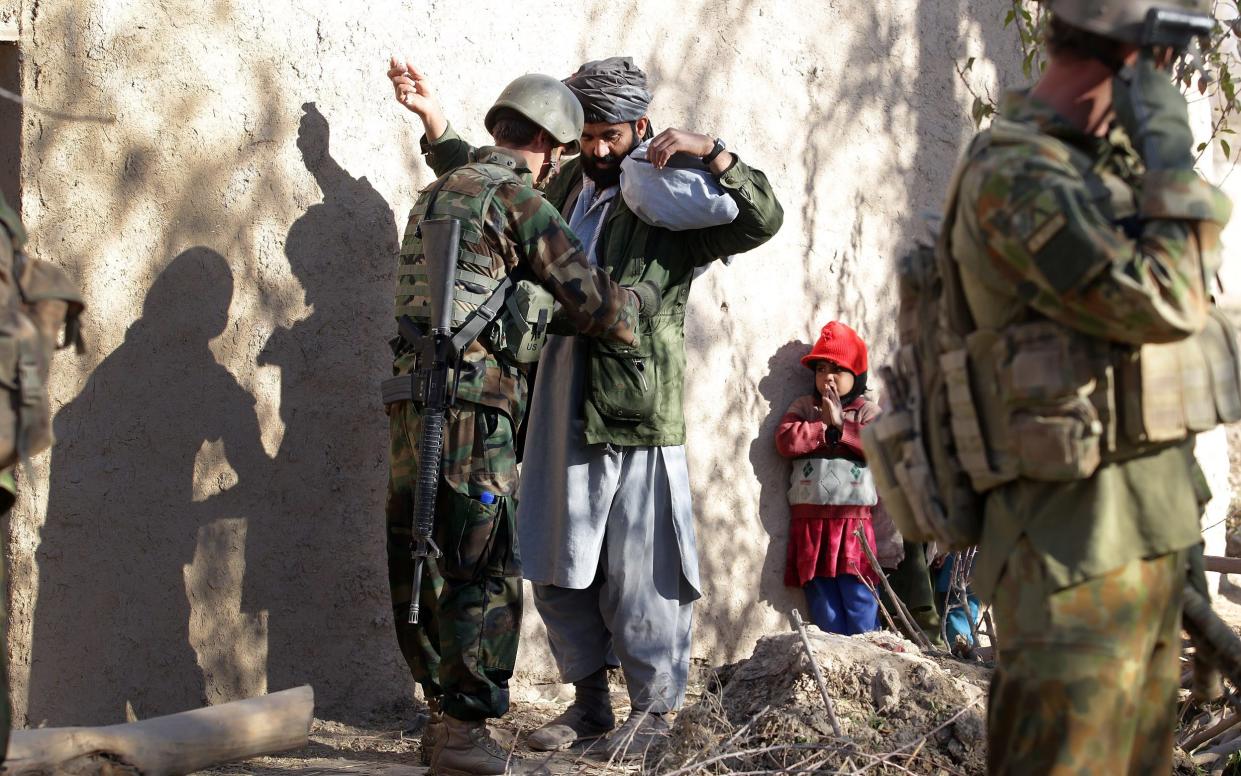 The Australian and Afghan National Army search a village in Uruzgan Province (file photo) - Angela Wylie/The AGE/Fairfax Media via Getty Images via Getty Images