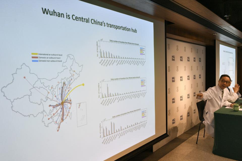 Gabriel Leung (R), chair professor of public health medicine at the Faculty of Medicine at the University of Hong Kong, speaks about the extent of the Wuhan coronavirus outbreak in China, during a press conference in Hong Kong on January 21, 2020. - The coronavirus, which has spread to three other Asian countries and infected more than 200 people in China, has caused alarm because of its genetic similarities to Severe Acute Respiratory Syndrome (SARS), which killed nearly 650 people across mainland China and Hong Kong in 2002-2003. (Photo by Anthony WALLACE / AFP) (Photo by ANTHONY WALLACE/AFP via Getty Images)